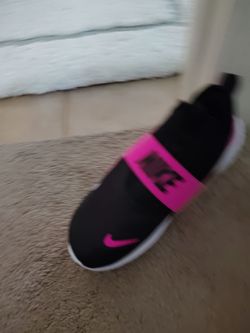 Girls shoes, hot pink and black. Brand is Nike. 6y