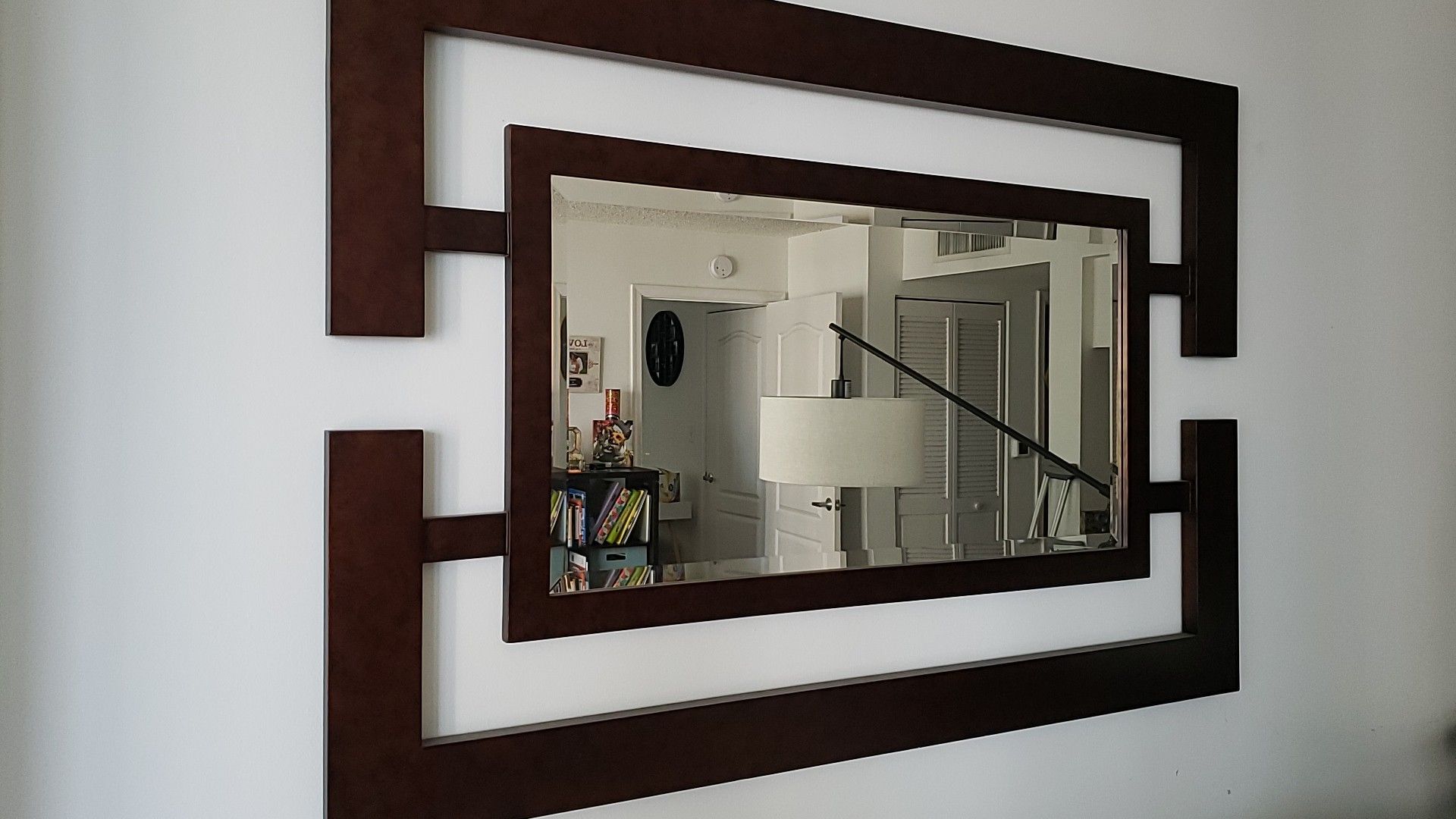 Dark brown wall mirror