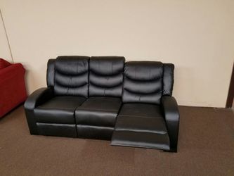 Leather reclining sofa