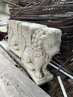 Pair of small griffin statues