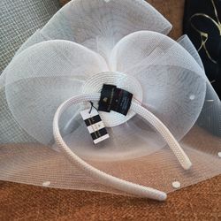 Brand new-  Lele Sadoughi white bridal fascinator hat, often used for weddings or formal events