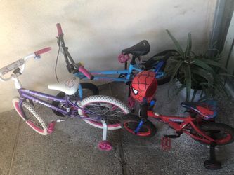 3 Kids Bikes two with Training Wheels