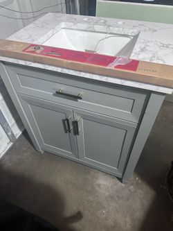 Bathroom vanity and faucet
