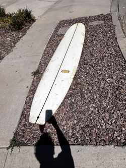 9 Foot Surfboard With Glassed On Fin. Some Damage But Works As A Great Beginner Board