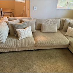4- and 5-piece modular sectional.

Available in black, beige, and gray.