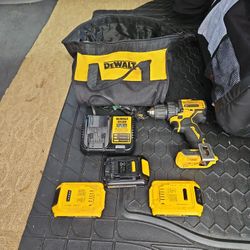 DeWalt 3 20 Volt Batteries 12/20 volt Battery charger and three batteries