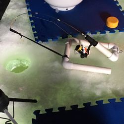 Ice Fishing Pole Holder And Jaw Jack