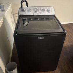 Black Maytag Washer. 