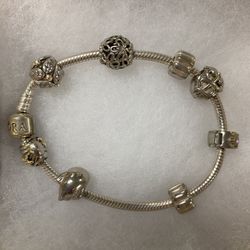 Pandora 7”  Silver Bracelet With Charms & Gold Accents 