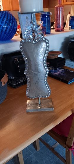 CANDLE METAL HOLDER.
