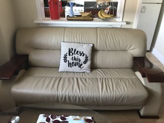 Beautiful genuine leather sofa. Beige and burgundy