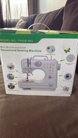 Opened new household sewing machine (mini multifunctional)