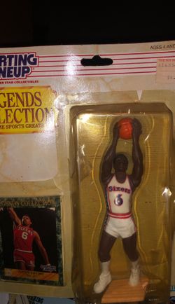 Dr J figure with card