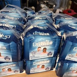 32 packs of Comfees DriNite premium youth pants L/XL 60- 125 + Lbs 27 -57 +kg  13 youth pants per pack  Pick up or meet up ⬆️ in Powder Springs Ga 301