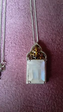 5 Carat Emerald cut Moonstone pendant with silver chain.