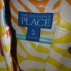 Children's Raincoat  Colorful Zebra Print & A Sweater Size 14/16 ASKING 10$ For Both Also Have Pictures Of The Sizes As Well