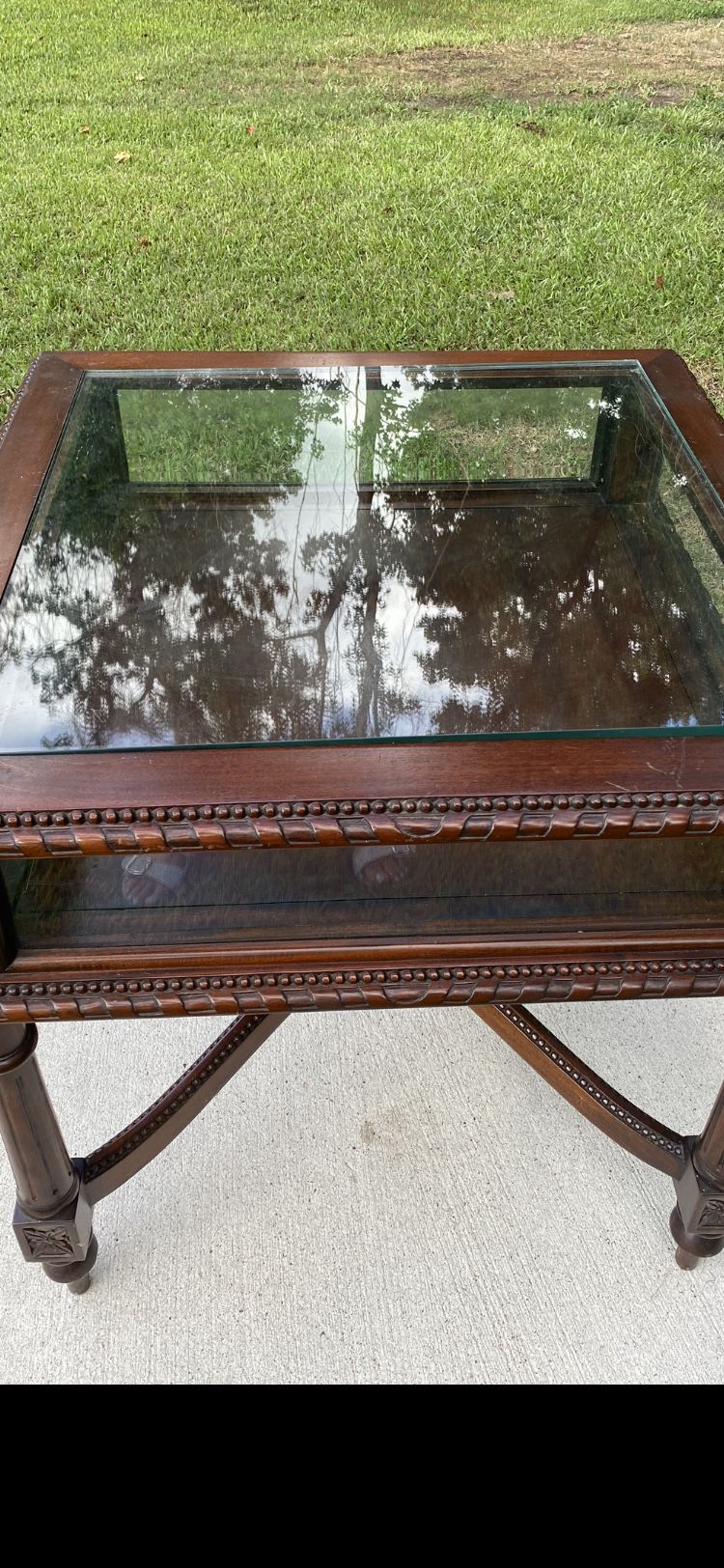 Antique glass curio table