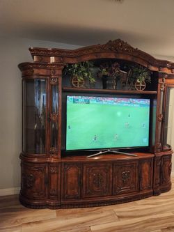 Large Wood Entertainment Center with Display Cabinets and 60 inch tv