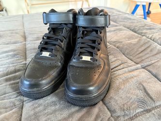 All black Nike Airforce 1 mid tops