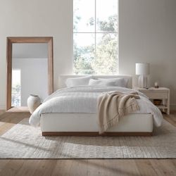 Crate & Barrel "Gather" upholstered queen bed frame and a Stearns & Foster pillow top mattress