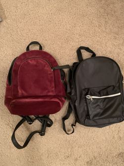 2 mini backpacks. Red velvet made by Mudd. Black one is polyester.