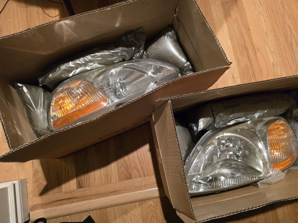 1(contact info removed) Honda Civic OEM Headlights (Right and Left)
