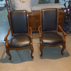 2 Black all Wood leather chairs 18.5" H x 22" W X 19" D seat.
