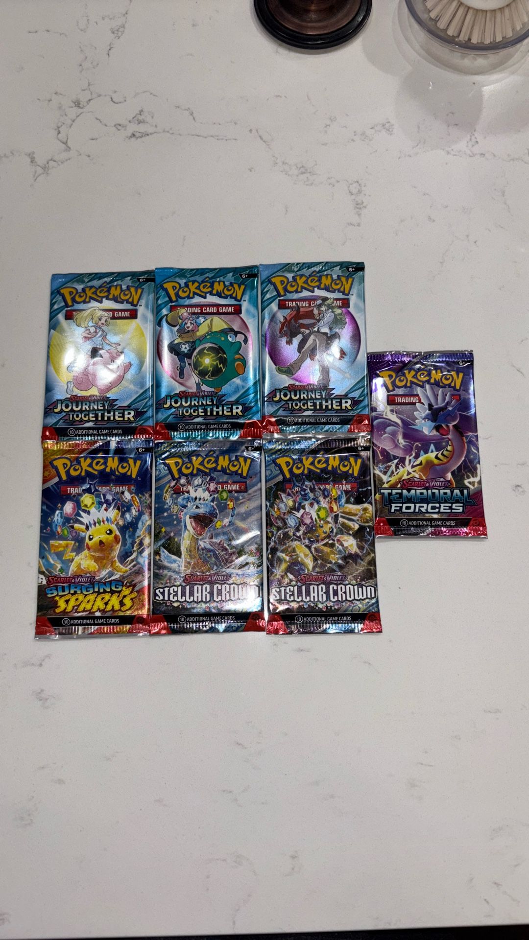 Seven Pokémon Tcg Packs