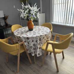 A small round table and four chairs.