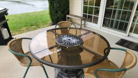 Outdoor glass table 47" with 3 chairs