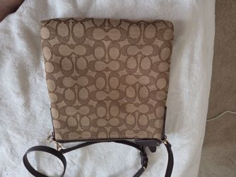 2 Michael Kors and 1 Coach