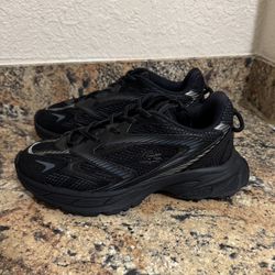 Lacoste L003 Neo Shot 125 black