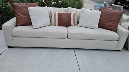 Large Beige Fabric Two-Cushion Sofa