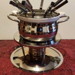 13 pc., 1.5 qt. Gourmet Ceramic and Acier Inoxydable Fondue Pot Set.  Fondue is a communal Swiss dish of melted cheese, meats or chocolates or use you