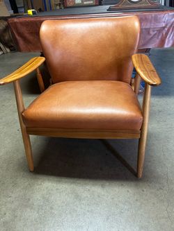 Individual leather chair 32” height 29”length 34 width