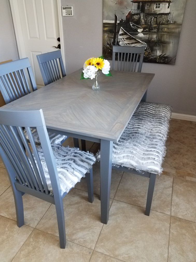 Dining table with 4 chairs and one bench