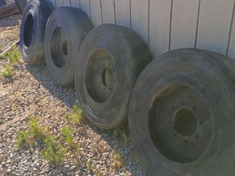Skid steer / bobcat/ John Deer Rims and Tires 8Lug