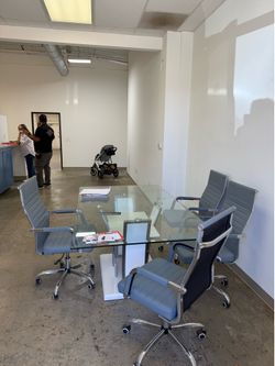 Glass conference table 4 leather chairs