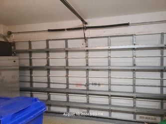 Garage Door Broken Spring Opener Off Track Adjustment Replace And Parts 