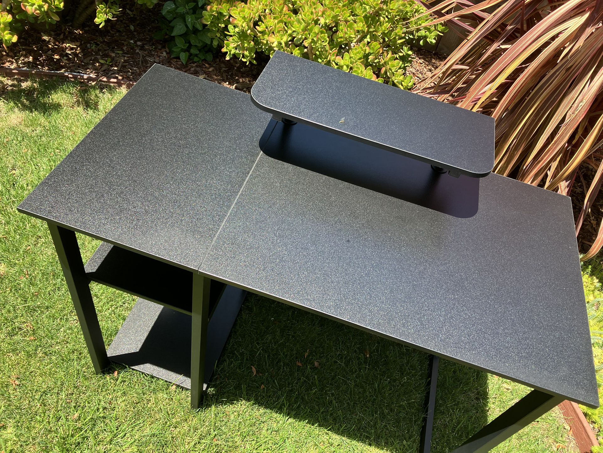 Like new///Black desk with built-in monitor riser & shelves