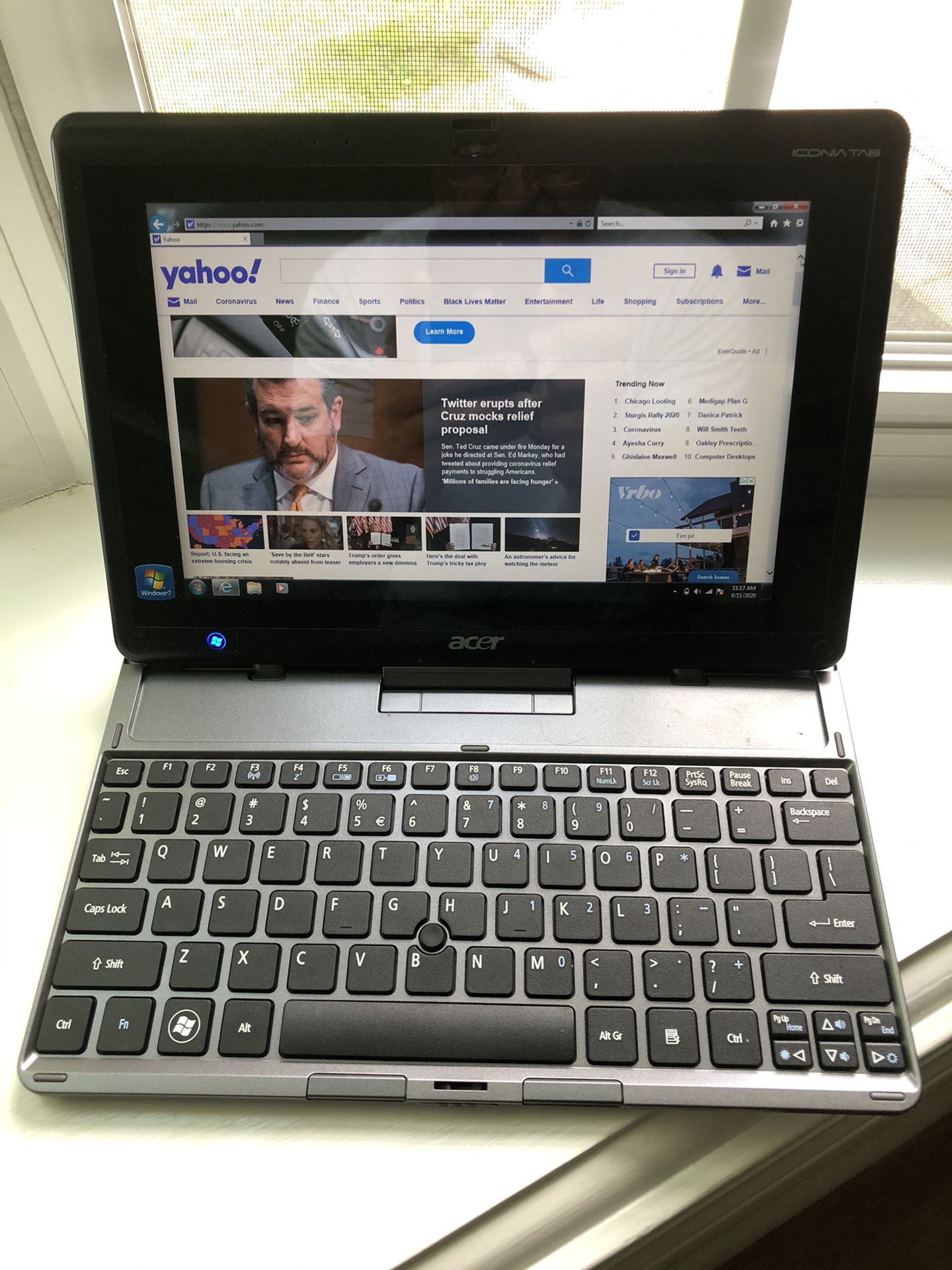 Acer Iconia tablet/laptop- like new! New charger included!
