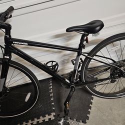 Canondale mountain bike with bottle holder and helmet