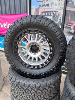 KMC Offroad wheels tires 6lug Chevy with 35-37