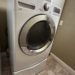 LG  7.4 Cu. Ft Ultra Large Capacity  SteamDryer and Pedestal