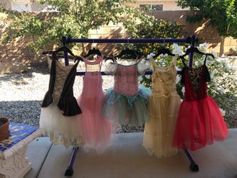 Brand new ballet barre and 5 ballet dresses(brand: revolution)