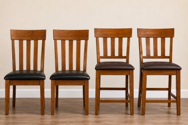 4 Set of signature design by Ashley dining chairs (2) and counter chairs (2)