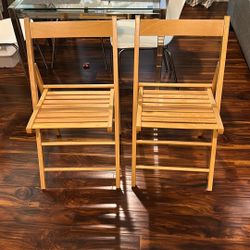 2 Identical Folding Chairs