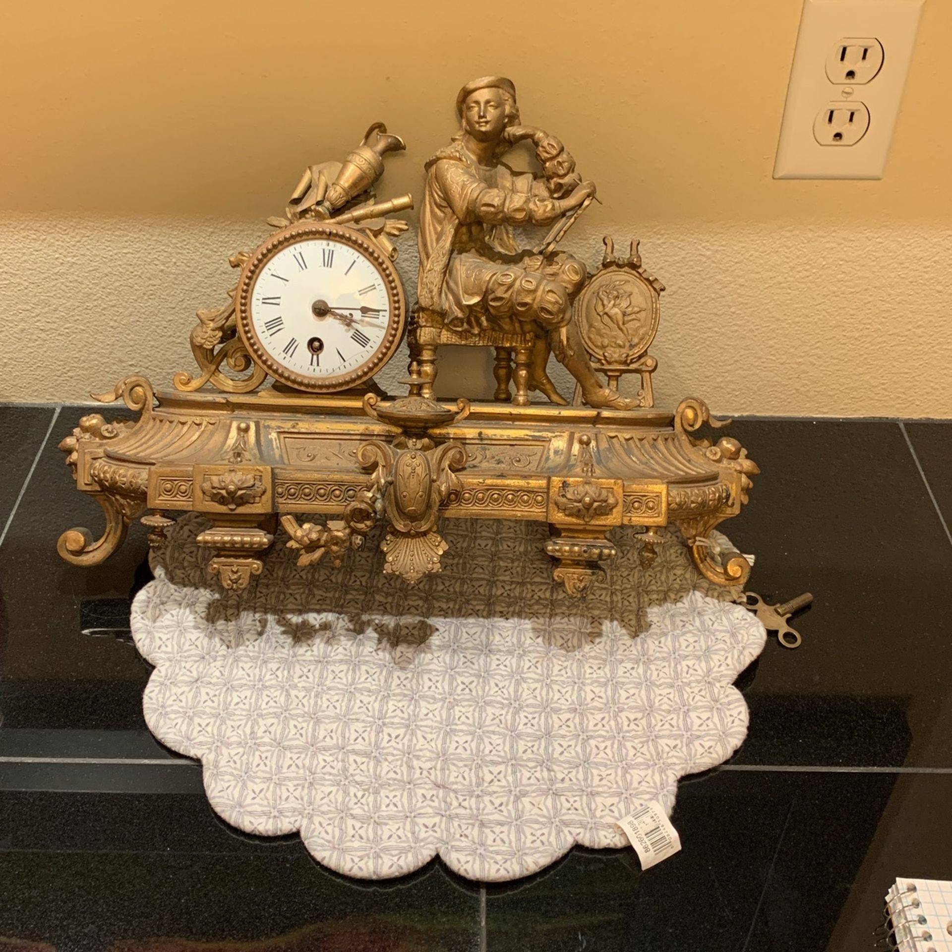 Antique French mantle, Clock