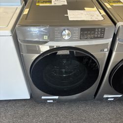 Brand new samsung washing machine only(dent on front)