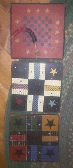 3 rustic game boards
